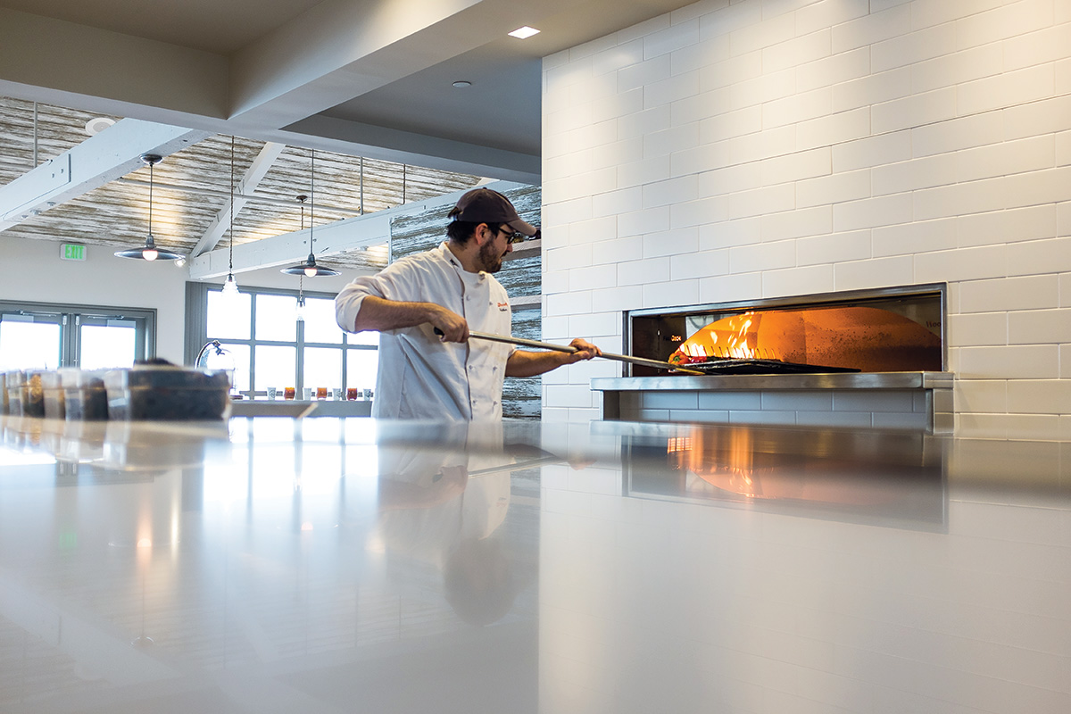 Student Using Hearth Oven at Institute of Culinary Education