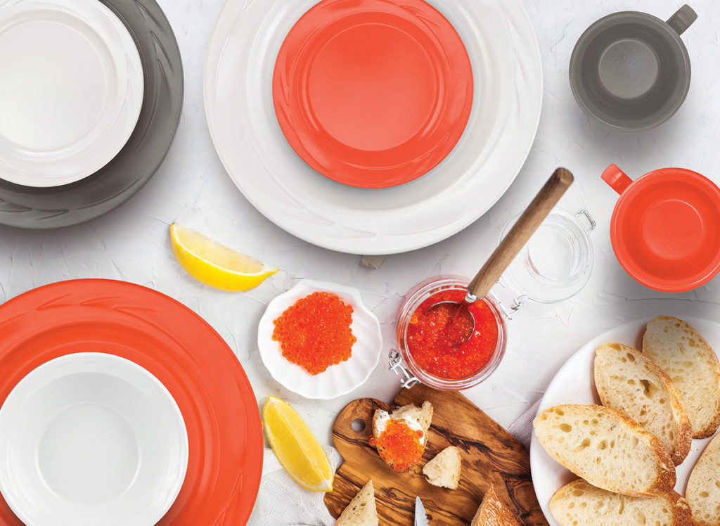 Delicious lunch with salted salmon, red caviar, fresh bread and cream cheese, top view