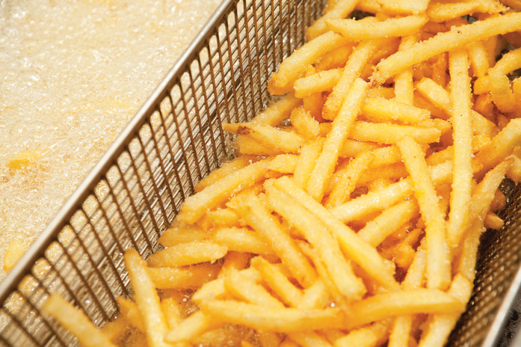 Fast Food French Fries in Restaurant Deep Fryer