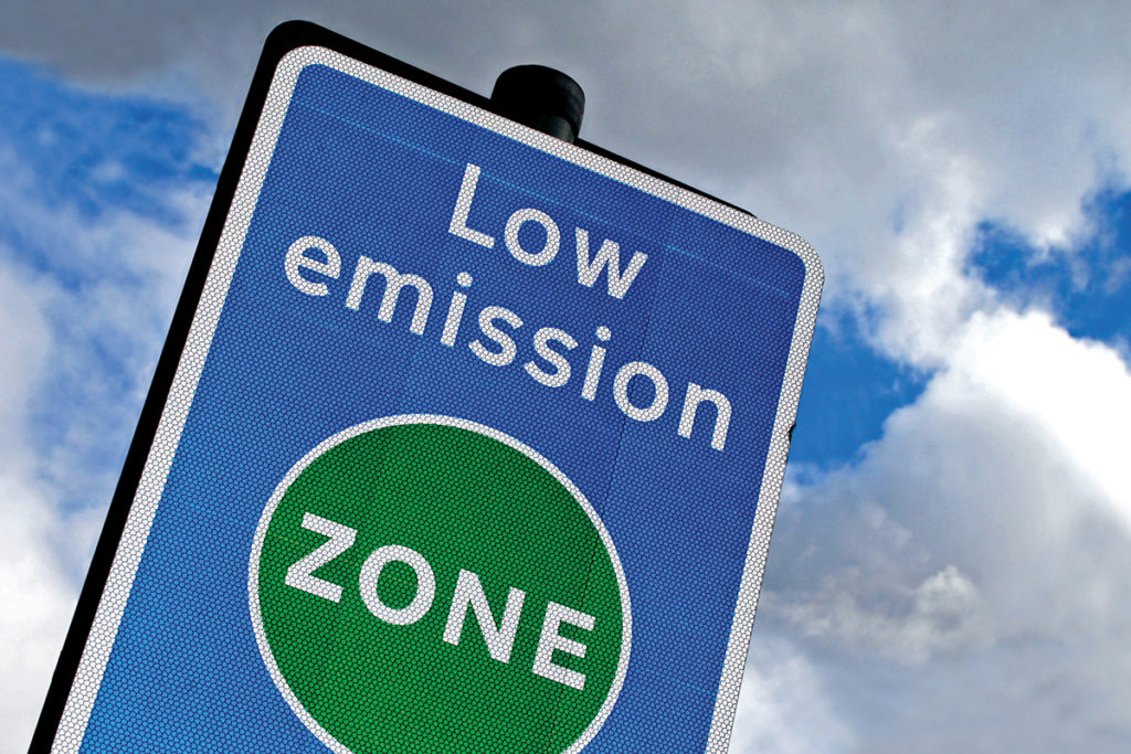 Low emission zone in London aimed at preventing pollution in the City. Metallic Reflective Material.