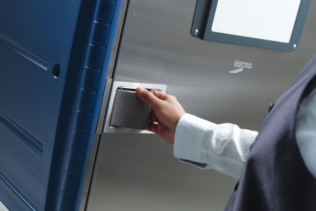 Practically everything about a mobile refrigerator’s construction enables it to withstand transport. Here, a paddle latch that sits flush with the door won’t get caught on wall corners or door frames. Courtesy of Metro.