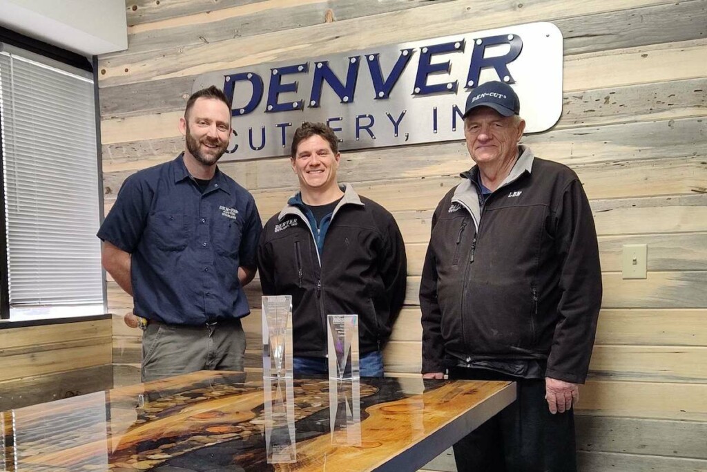 Denver Cutlery representatives (left to right) Tom Eaton, VP of engineering and manufacturing, Charlie Rudibaugh, president, and Len Schremmer, sales (with Denver Cutlery since 1986), pose with their latest honors: a Nissco New Horizons award and a Dealer of the Year award. Photo Courtesy of Denver Cutlery