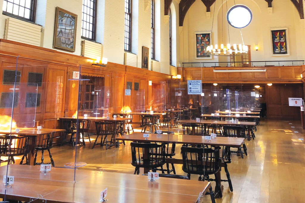 Yale Hospitality cleans and sanitizes the chair, table and safety barrier each time a student dines in a location. Photo by Tony Mastres and Christelle Ramos.