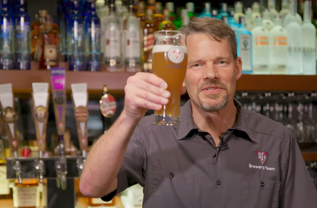 Alex Puchner, senior vice president of brewing operations at BJ’s Restaurants, introduces the restaurant chain’s bimonthly subscription beer club—one of several innovations the chain's executives expect to drive sales in 2021. Image Courtesy of BJ’s/YouTube
