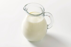 Fresh milk in glass pitcher
