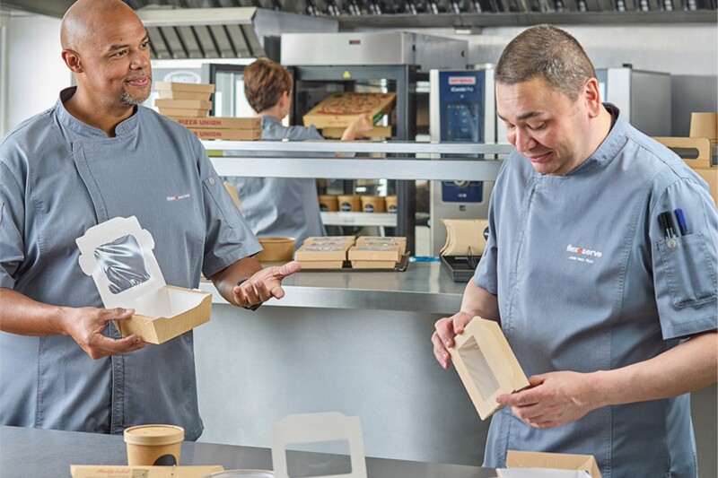 Chef Sean Landrum and Chef JP Felix in kitchen