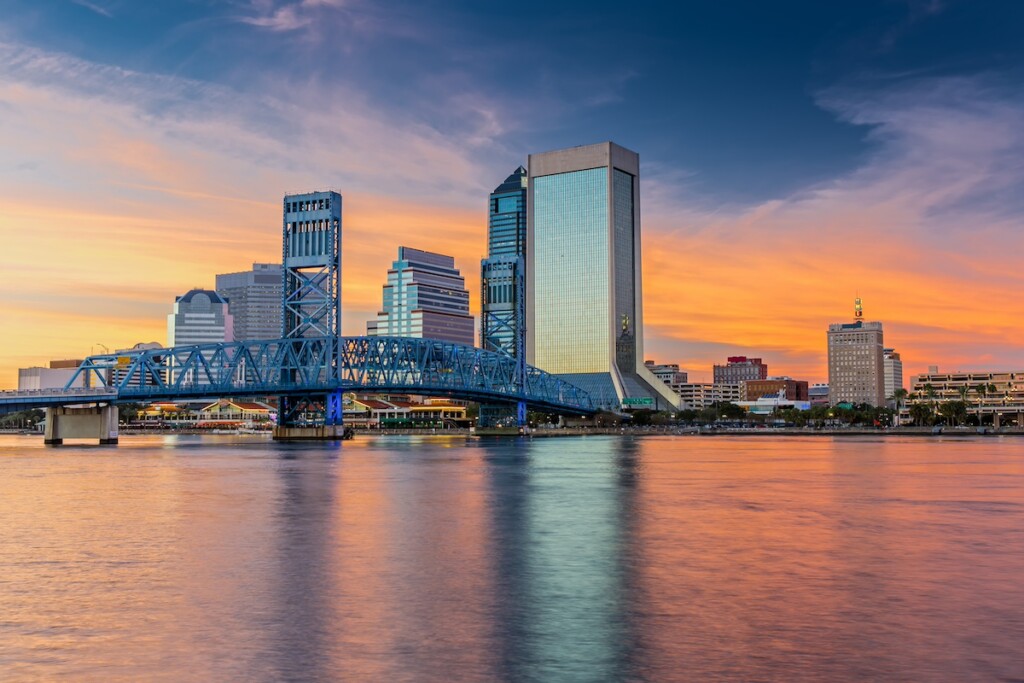 Skyline of Jacksonville, FL and Main Street Bridge at Dusk Skyline of Jacksonville, FL and Main Street Bridge at Dusk
