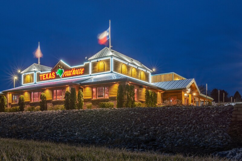 New Hartford, New York Mar 19, 2020: Night View of Texas Roadhouse Restaurant Location, Texas Roadhouse is a Chain Restaurant Offering Western Theme steak Meals at over 450 Locations.