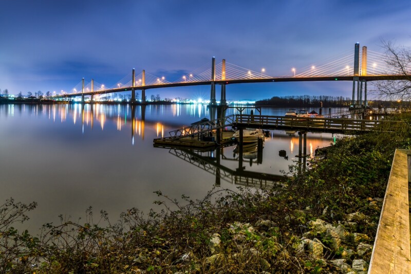 The Golden Ears Bridge, conecting Maple Ridge to Langley. Long exposure at night, reflecting into Fraser River.