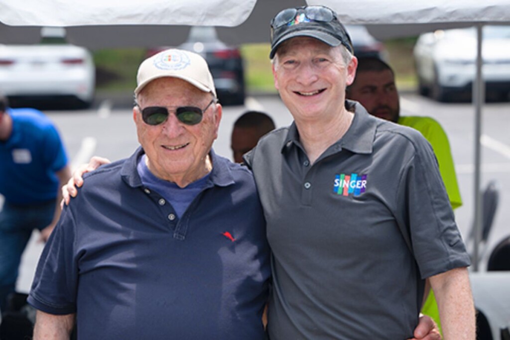 Henry and Fred Singer, president of Singer Equipment Co.